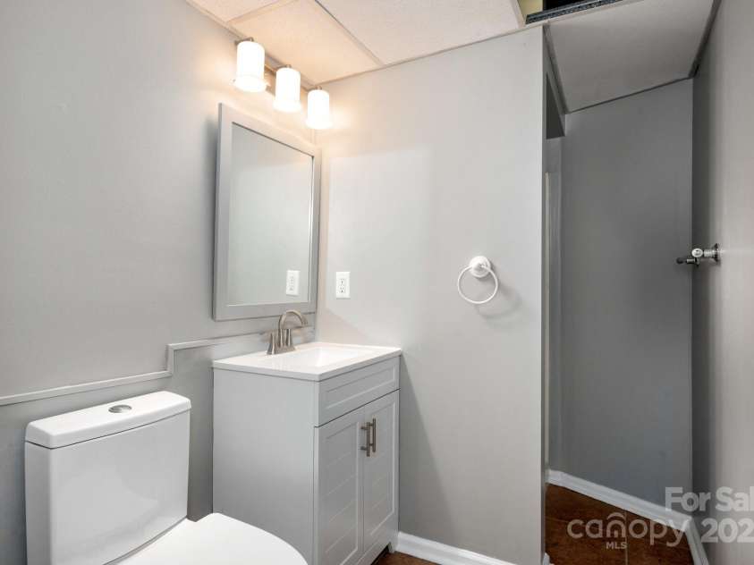 1572 Alexander Road, Leicester, NC 28748.  MLS# CAR4252081, YatesRealty ID 12882. Lower Level Bathroom