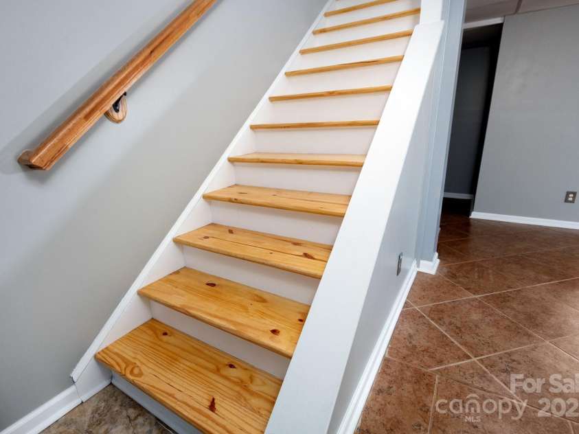 1572 Alexander Road, Leicester, NC 28748.  MLS# CAR4252081, YatesRealty ID 12882. Stairway to Lower Level