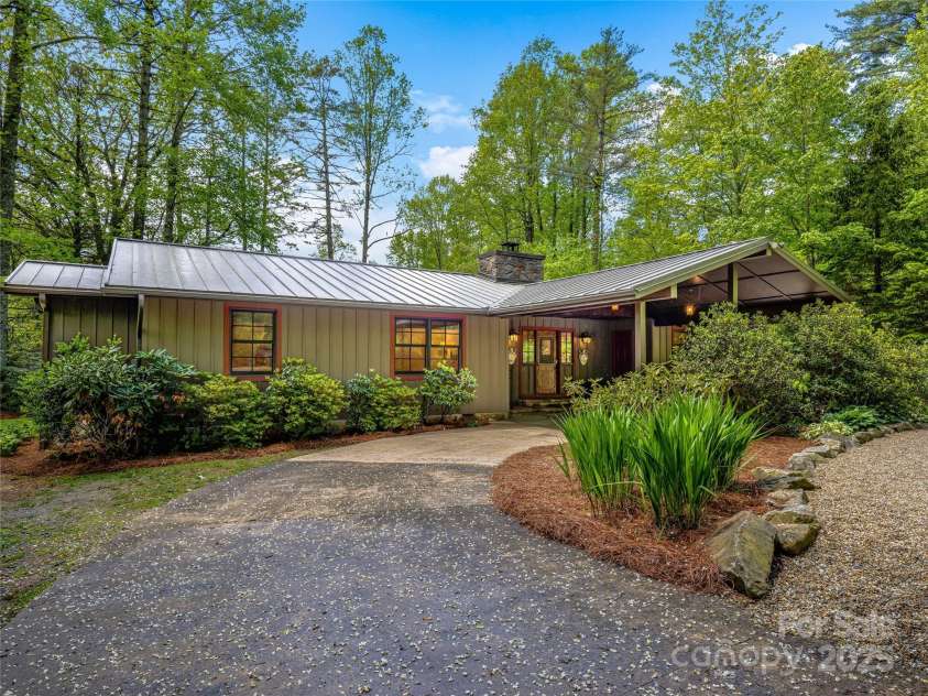 145 Island Point Road, Lake Toxaway, NC 28747.  MLS# CAR4259038, YatesRealty ID 12884. 