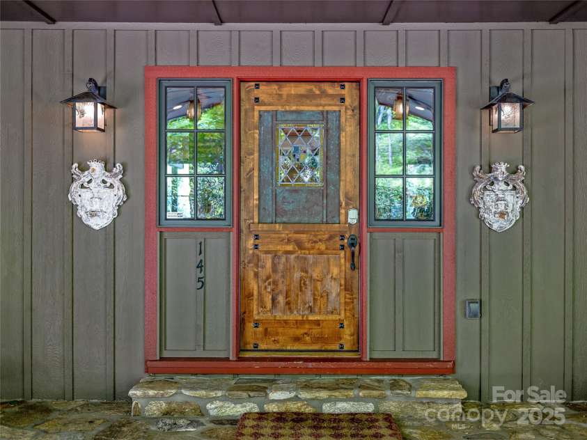 145 Island Point Road, Lake Toxaway, NC 28747.  MLS# CAR4259038, YatesRealty ID 12884. 