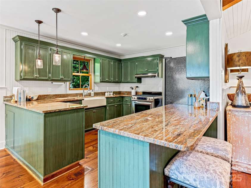 145 Island Point Road, Lake Toxaway, NC 28747.  MLS# CAR4259038, YatesRealty ID 12884. 