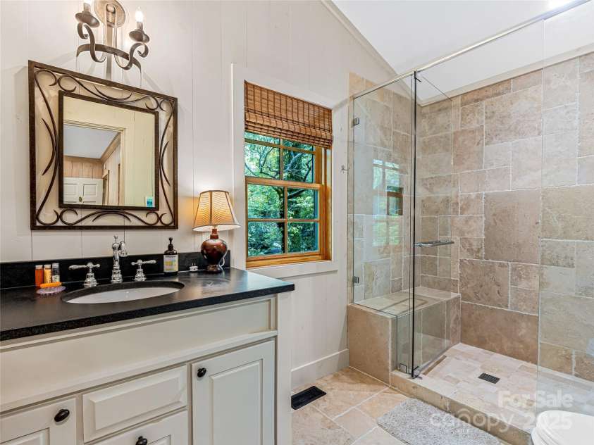 145 Island Point Road, Lake Toxaway, NC 28747.  MLS# CAR4259038, YatesRealty ID 12884. 