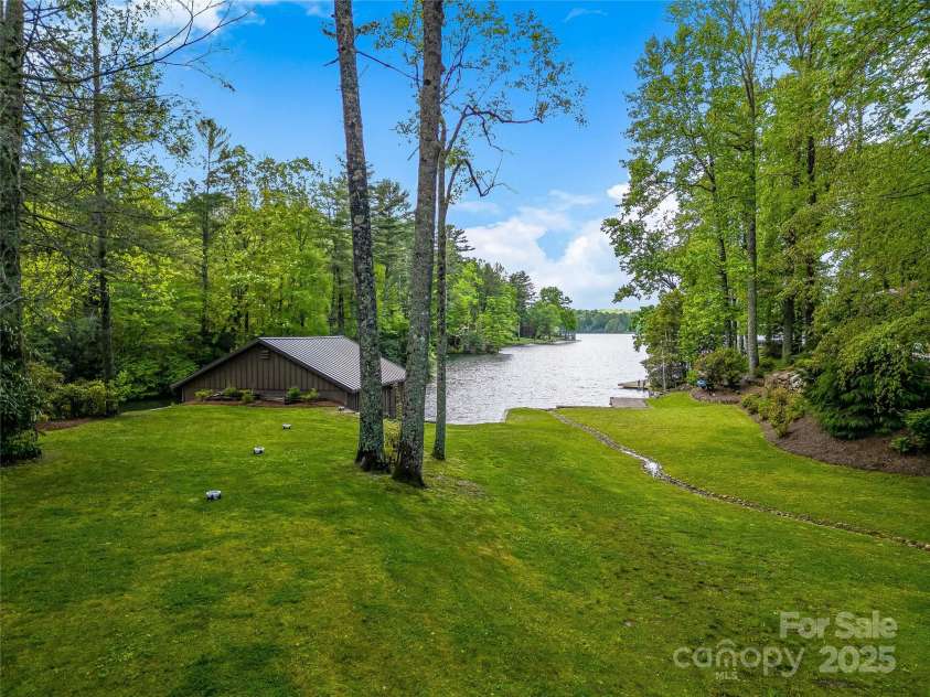 145 Island Point Road, Lake Toxaway, NC 28747.  MLS# CAR4259038, YatesRealty ID 12884. 