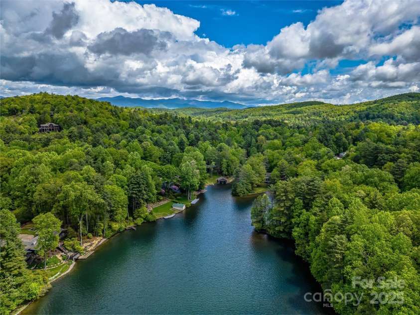 145 Island Point Road, Lake Toxaway, NC 28747.  MLS# CAR4259038, YatesRealty ID 12884. 