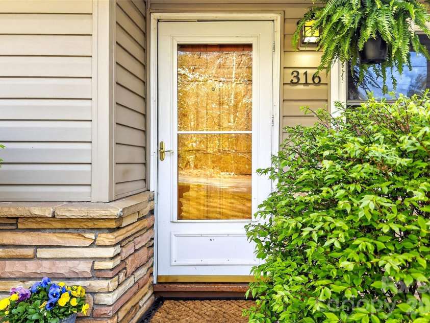 316 Wilson Avenue, Swannanoa, NC 28778.  MLS# CAR4361126, YatesRealty ID 12884. 