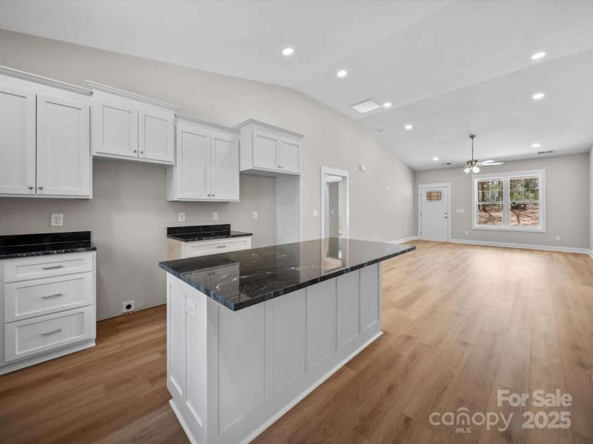 297 Barr Link Road, Mount Pleasant, NC 28124.  MLS# CAR4243604, YatesRealty ID 12887. Kitchen/Dining Area/Living Room Area