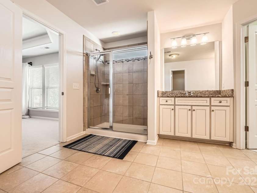 15317 Colonial Park Drive, Huntersville, NC 28078.  MLS# CAR4235256, YatesRealty ID 12888. Primary Bathroom