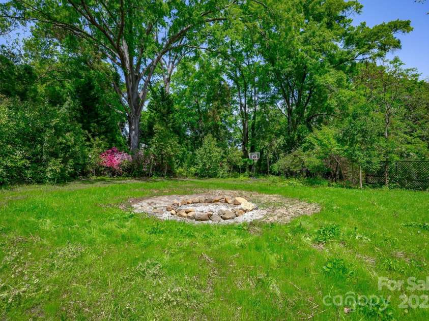 402 Hudson Street, Winnsboro, SC 29180.  MLS# CAR4248158, YatesRealty ID 12891. Fire Pit Area in back yard