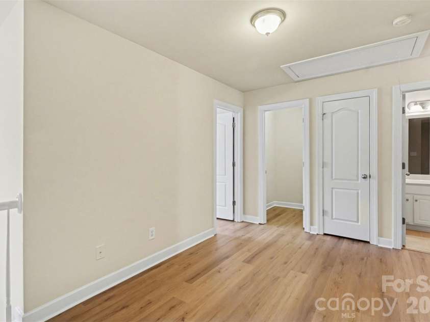 10947 Coyote Lane, Charlotte, NC 28277.  MLS# CAR4365778, YatesRealty ID 12901. Study nook/landing upper level