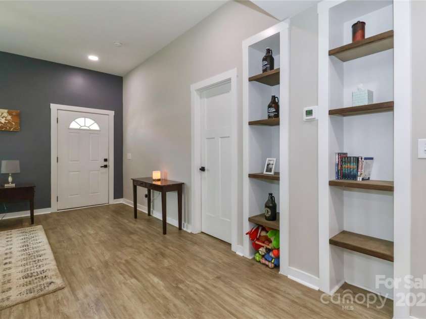 703 Main Street, Landis, NC 28088.  MLS# CAR4249168, YatesRealty ID 12901. Front Door and Primary Room Door