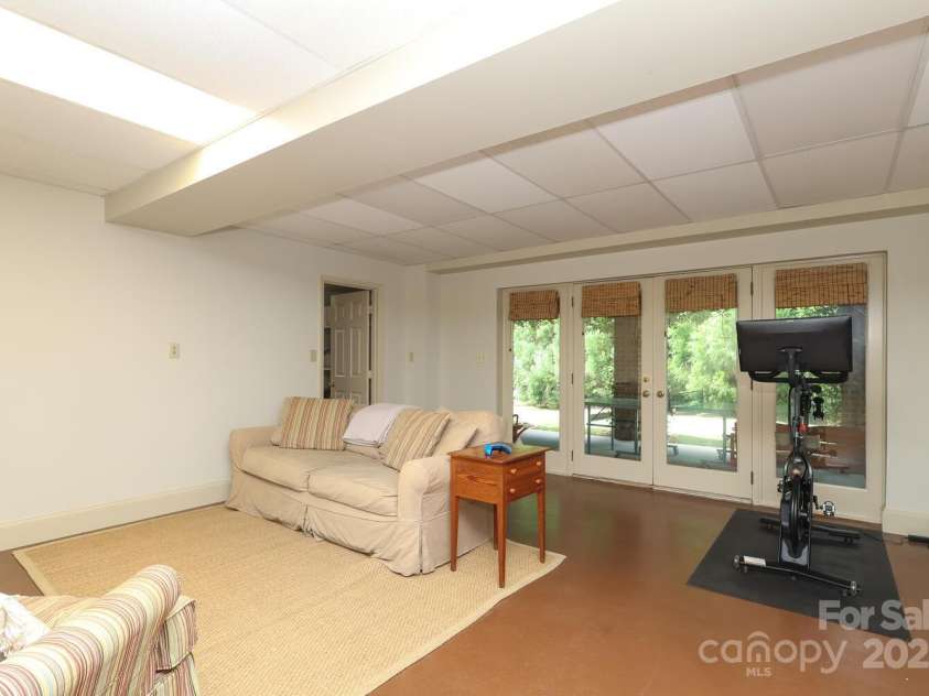 1638 Myers Park Drive, Charlotte, NC 28207.  MLS# CAR4258677, YatesRealty ID 12904. Basement looking out to the backyard.