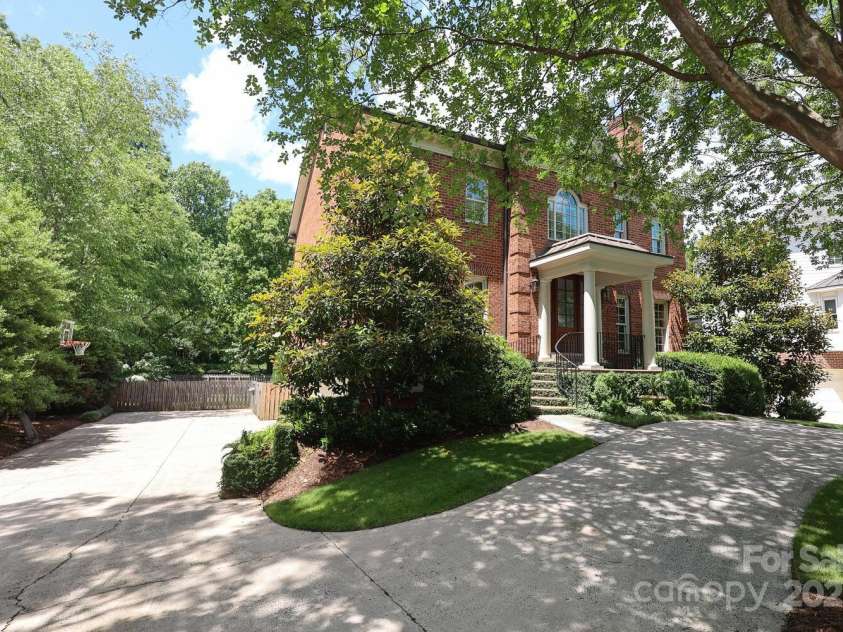 1638 Myers Park Drive, Charlotte, NC 28207.  MLS# CAR4258677, YatesRealty ID 12904. In addition to the circular driveway, there is an attached 2-car garage for ample parking.