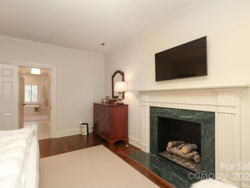 1638 Myers Park Drive, Charlotte, NC 28207.  MLS# CAR4258677, YatesRealty ID 12904. The Primary Bedroom even has a fireplace!