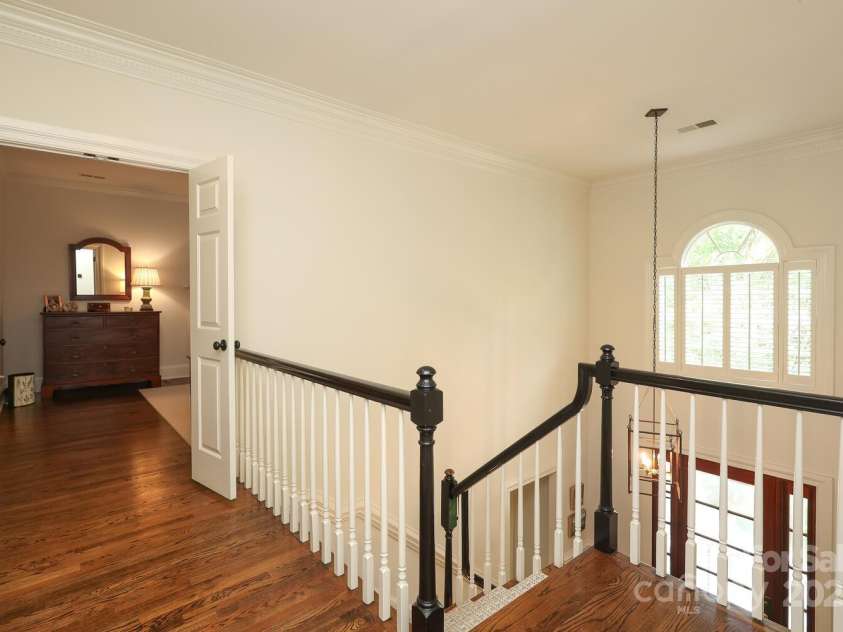 1638 Myers Park Drive, Charlotte, NC 28207.  MLS# CAR4258677, YatesRealty ID 12904. Upstairs Hall looking into the Primary Bedroom
