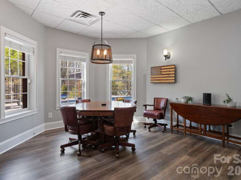 183 April Road, Troutman, NC 28166.  MLS# CAR4365014, YatesRealty ID 12908. Additional seating area overlooking the pool