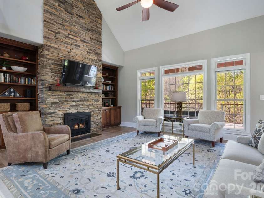 183 April Road, Troutman, NC 28166.  MLS# CAR4365014, YatesRealty ID 12908. Custom built-in bookcases add function and design