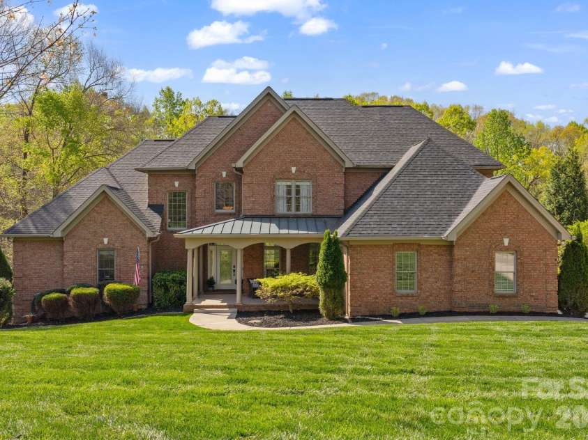 183 April Road, Troutman, NC 28166.  MLS# CAR4365014, YatesRealty ID 12908. Full brick waterfront home with everything you need and more!