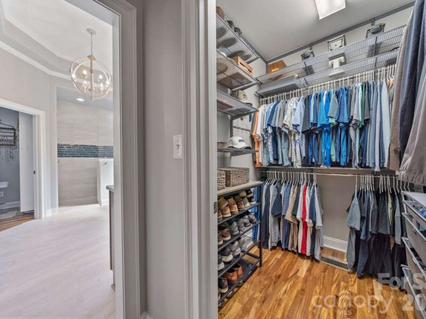 183 April Road, Troutman, NC 28166.  MLS# CAR4365014, YatesRealty ID 12908. His & hers walk-closets add to the function of this primary suite