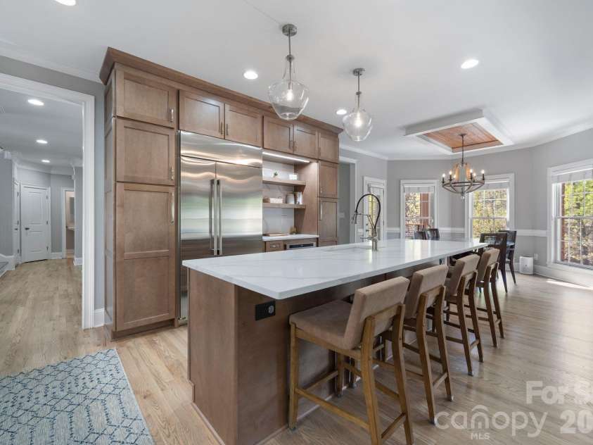183 April Road, Troutman, NC 28166.  MLS# CAR4365014, YatesRealty ID 12908. Pendant lights add warmth and style