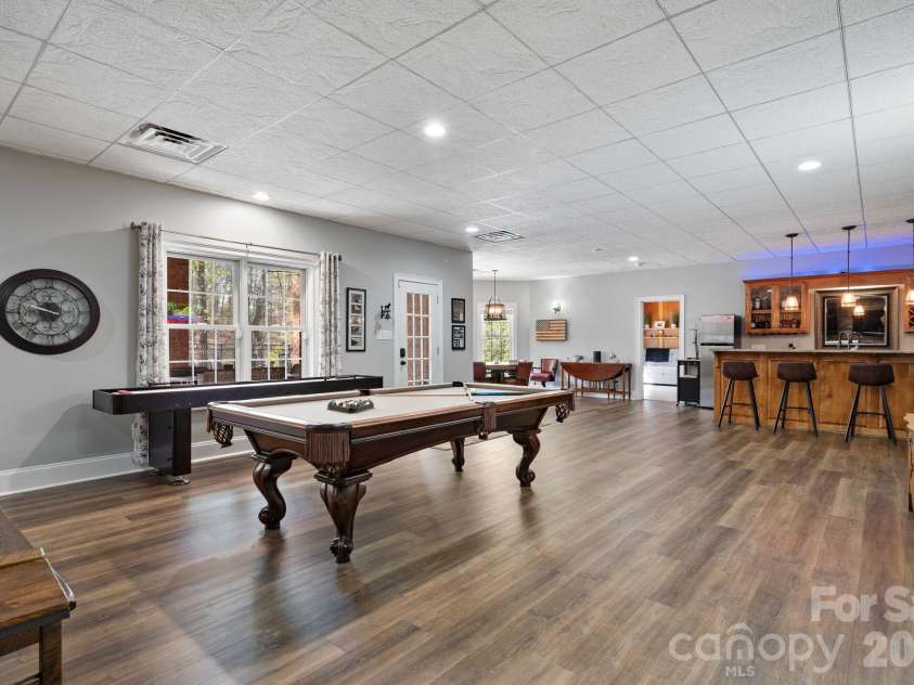 183 April Road, Troutman, NC 28166.  MLS# CAR4365014, YatesRealty ID 12908. Rec room with pool table 