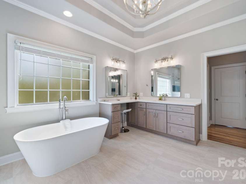183 April Road, Troutman, NC 28166.  MLS# CAR4365014, YatesRealty ID 12908. Soaking tub add to the spa like experience