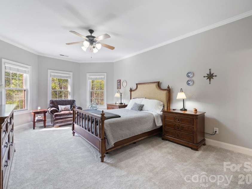 183 April Road, Troutman, NC 28166.  MLS# CAR4365014, YatesRealty ID 12908. Spacious 2nd guest bedroom with lake views