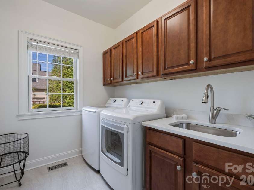 183 April Road, Troutman, NC 28166.  MLS# CAR4365014, YatesRealty ID 12908. Updated laundry room floor and counter top