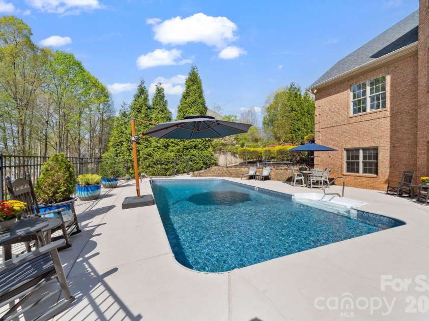 183 April Road, Troutman, NC 28166.  MLS# CAR4365014, YatesRealty ID 12908. Your own private backyard retreat