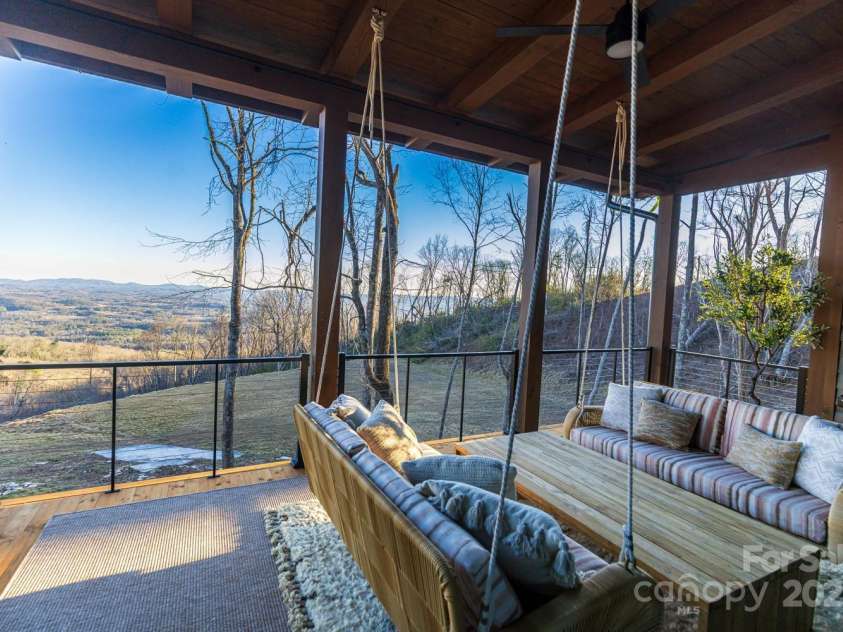 432 Garden Trail, Hendersonville, NC 28792.  MLS# CAR4217573, YatesRealty ID 1291. Relax on the covered deck with breathtaking views