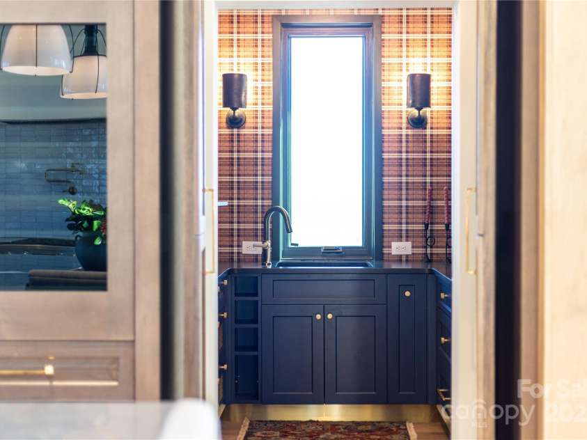 432 Garden Trail, Hendersonville, NC 28792.  MLS# CAR4217573, YatesRealty ID 1291. Secret Butlers Pantry