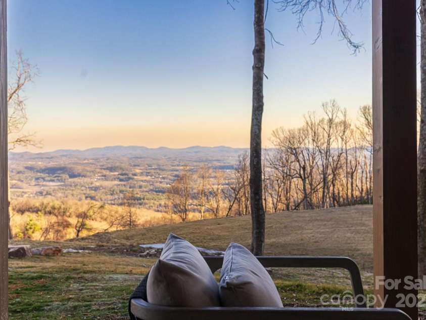 432 Garden Trail, Hendersonville, NC 28792.  MLS# CAR4217573, YatesRealty ID 1291. View from lower level patio