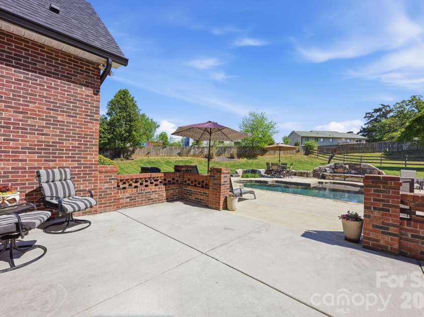 145 Blue Grass Circle, Mooresville, NC 28117.  MLS# CAR4369694, YatesRealty ID 12910. Brick-Walled Terrace