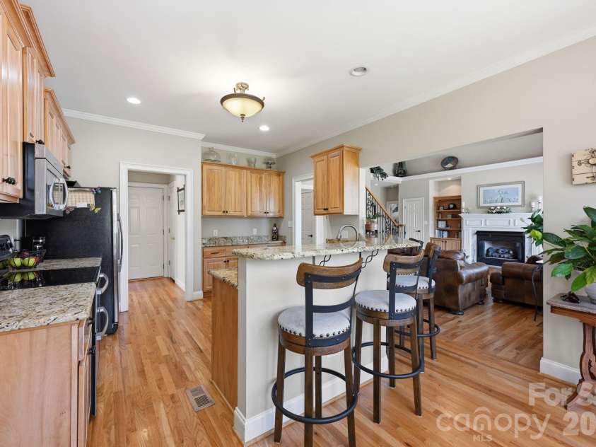 145 Blue Grass Circle, Mooresville, NC 28117.  MLS# CAR4369694, YatesRealty ID 12910. Kitchen with Breakfast Bar