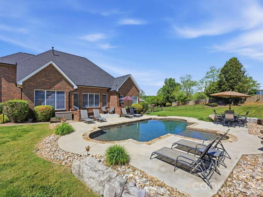 145 Blue Grass Circle, Mooresville, NC 28117.  MLS# CAR4369694, YatesRealty ID 12910. Pool and Lounging Area