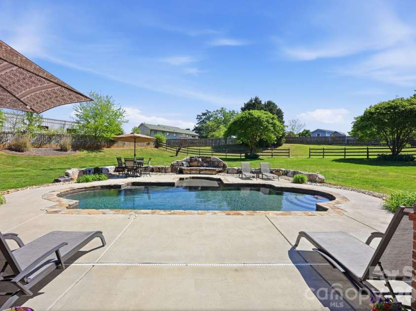 145 Blue Grass Circle, Mooresville, NC 28117.  MLS# CAR4369694, YatesRealty ID 12910. Pool and Lounging Area
