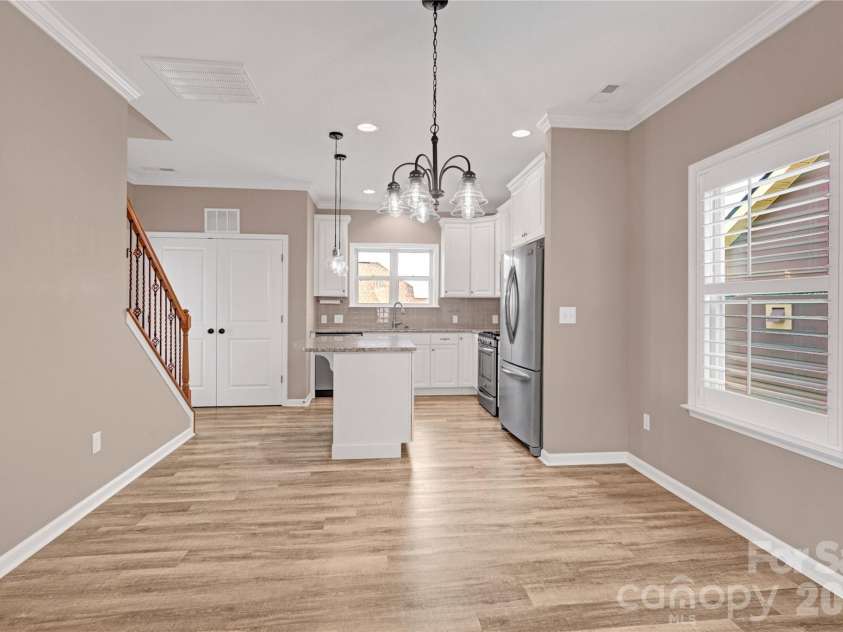 119 Canter Lane, Mooresville, NC 28115.  MLS# CAR4301770, YatesRealty ID 12912. Open dining area looking into the kitchen