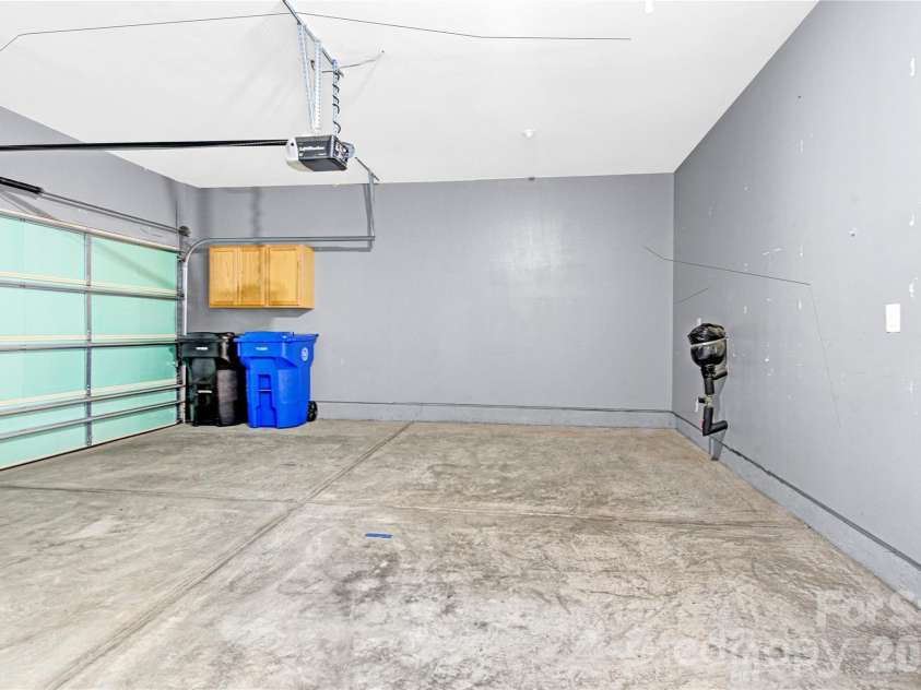 119 Canter Lane, Mooresville, NC 28115.  MLS# CAR4301770, YatesRealty ID 12912. Two car garage with attic pull down