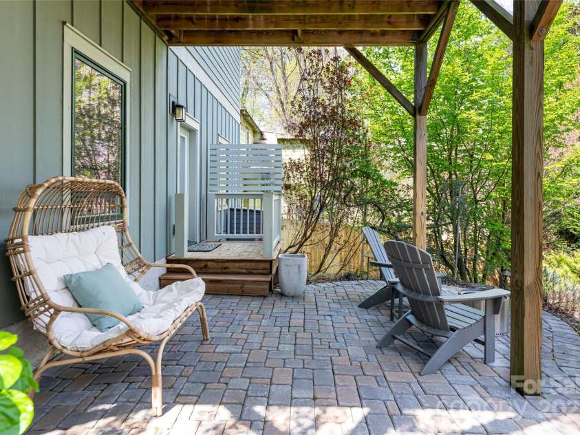 123 Brucemont Circle, Asheville, NC 28806.  MLS# CAR4243133, YatesRealty ID 12914. Covered patio off homestay entrance