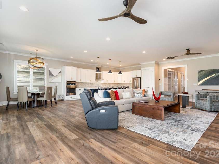 21016 Molly Harper Drive, Cornelius, NC 28031.  MLS# CAR4320388, YatesRealty ID 12915. Step in from the patio to this expansive area