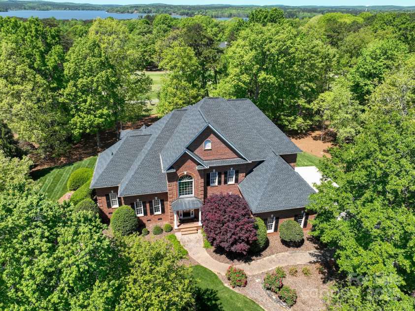 139 Stonebridge Drive, New London, NC 28127.  MLS# CAR4250902, YatesRealty ID 12917. Aerial Front View of Home