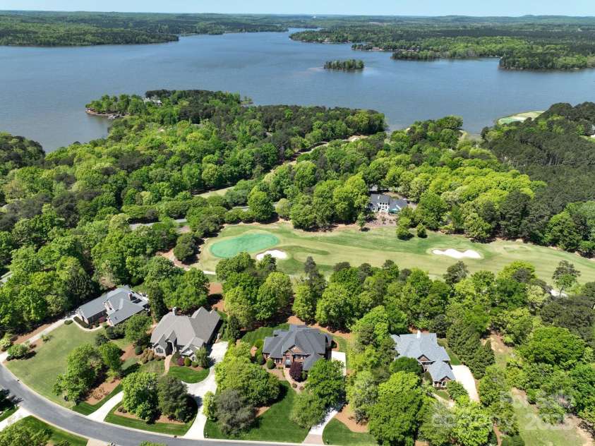 139 Stonebridge Drive, New London, NC 28127.  MLS# CAR4250902, YatesRealty ID 12917. Aerial View of Home and Golf Course