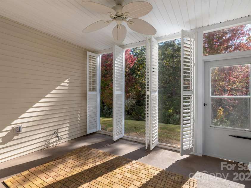 45014 Wigeon Lane, Indian Land, SC 29707.  MLS# CAR4194330, YatesRealty ID 12918. Screened porch with plantation shutters