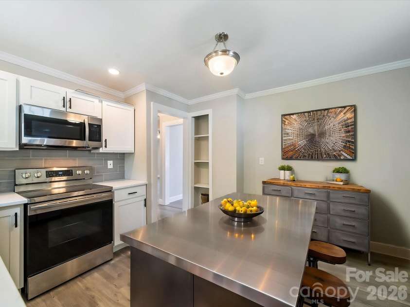 83 Woodsdale Place, Concord, NC 28025.  MLS# CAR4337022, YatesRealty ID 12918. Virtually Staged Kitchen
