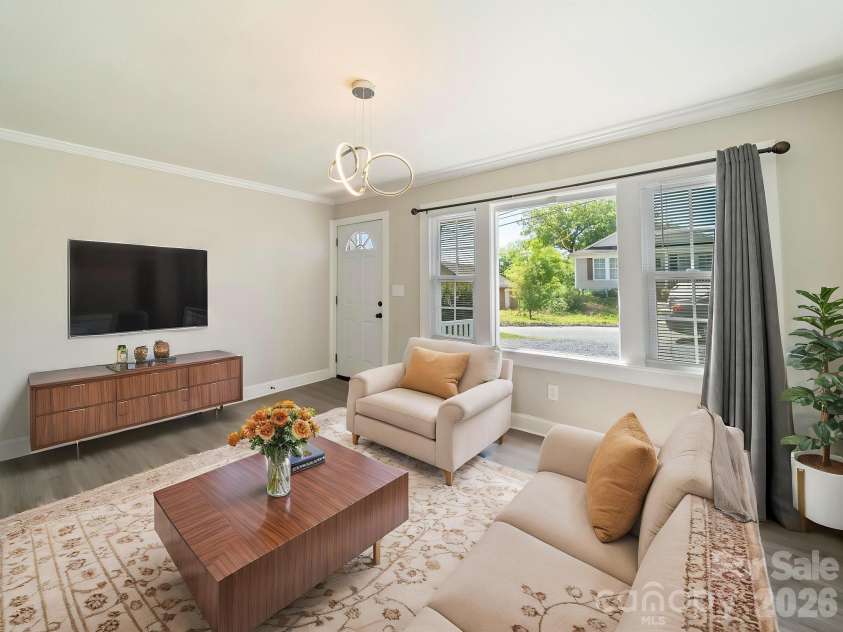 83 Woodsdale Place, Concord, NC 28025.  MLS# CAR4337022, YatesRealty ID 12918. Virtually Staged Living Room