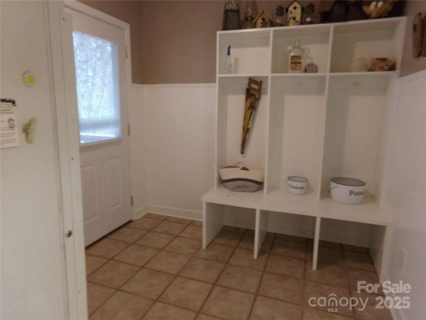 7218 Alexander Farm Road, Monroe, NC 28110.  MLS# CAR4238823, YatesRealty ID 12919. Entrance at utility room