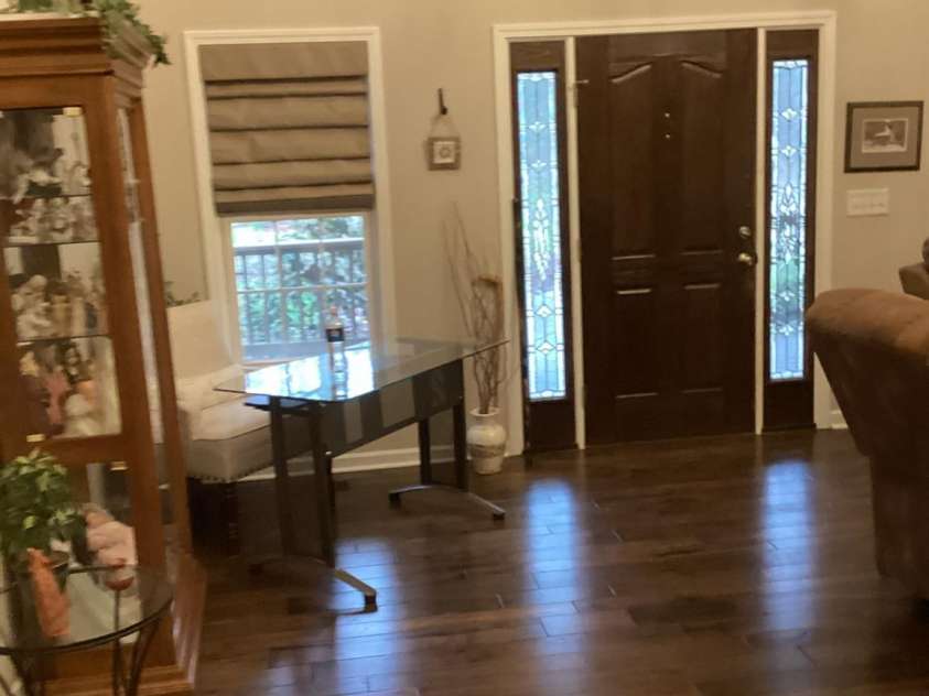 7218 Alexander Farm Road, Monroe, NC 28110.  MLS# CAR4238823, YatesRealty ID 12919. Living room front door area