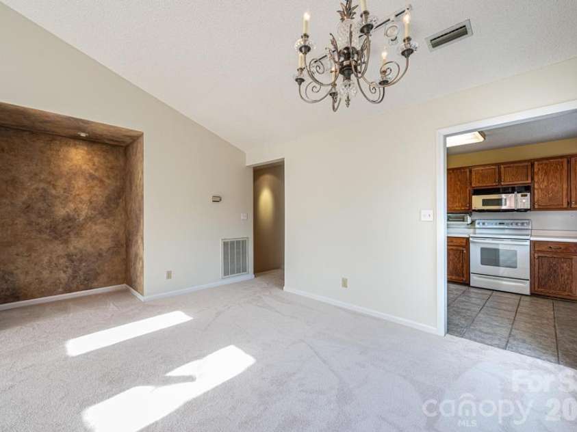 2231 6th Street, Hickory, NC 28601.  MLS# CAR4345373, YatesRealty ID 12920. Dining area that leads into the kitchen. 