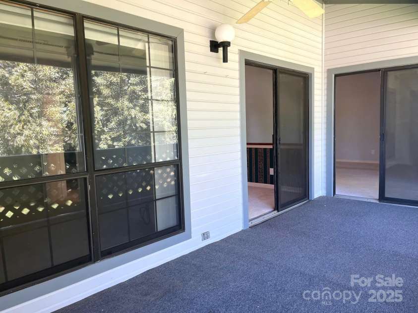5810 Harris Grove Lane, Charlotte, NC 28212.  MLS# CAR4246462, YatesRealty ID 12922. Primary bedroom windows on right, dining area center and living room to right