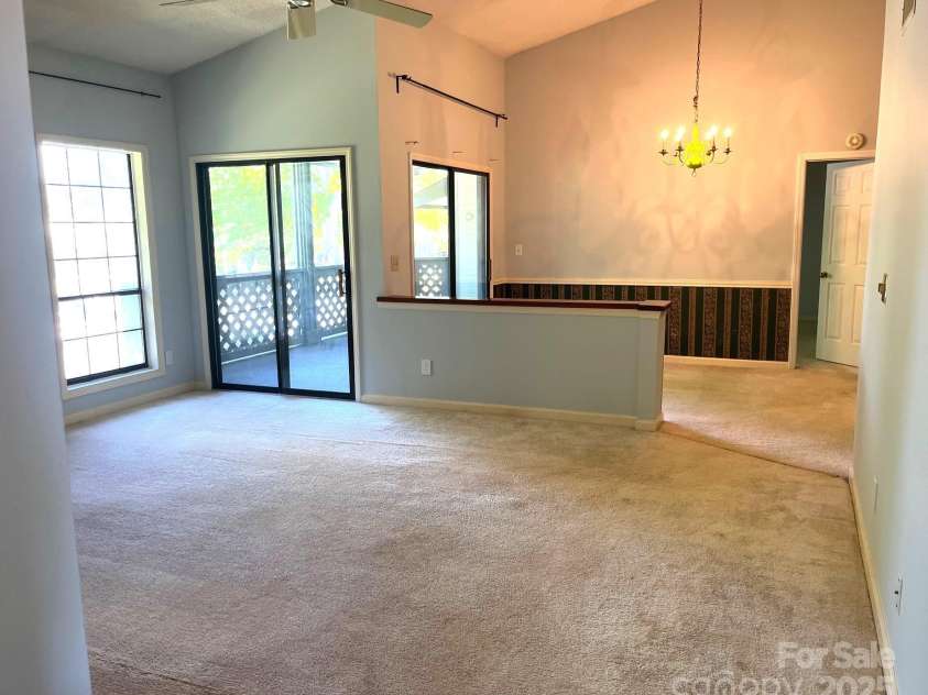 5810 Harris Grove Lane, Charlotte, NC 28212.  MLS# CAR4246462, YatesRealty ID 12922. Taken from entrance looking toward living and dining room