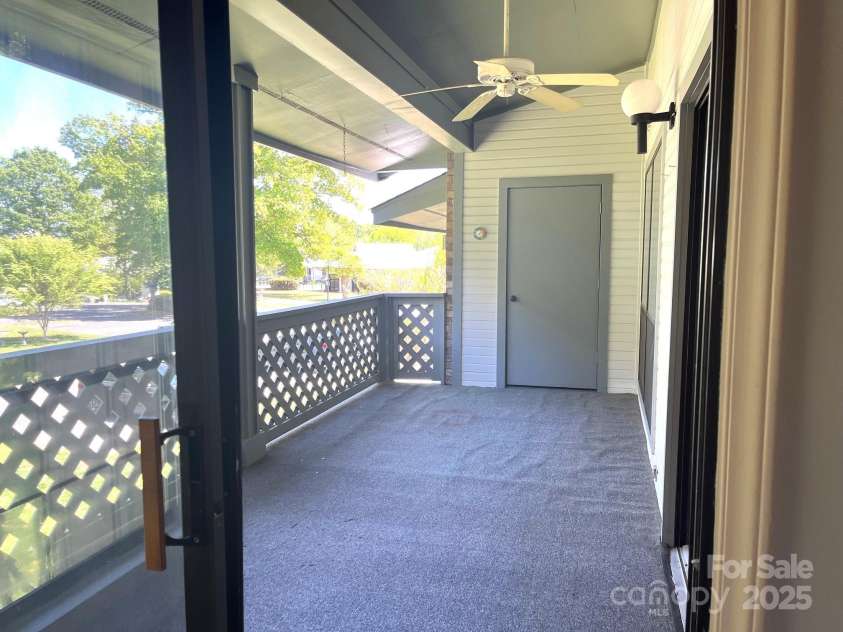 5810 Harris Grove Lane, Charlotte, NC 28212.  MLS# CAR4246462, YatesRealty ID 12922. Very large covered deck to relax in